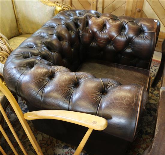 Buttoned leather club chair